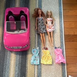 Barbie Pink Convertible with Dolls and Dresses